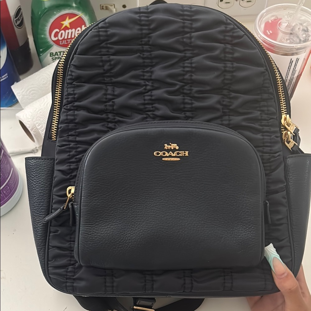 Coach Quilted Black Backpack with Gold Details